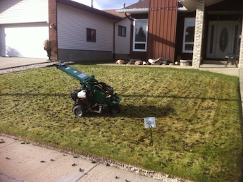 lawn aeration edmonton - lawn care work